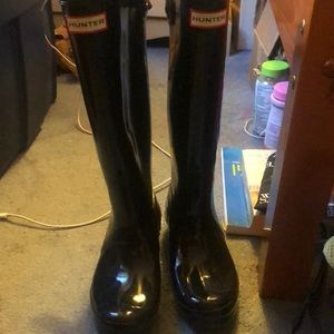 Black shiny hunter boots